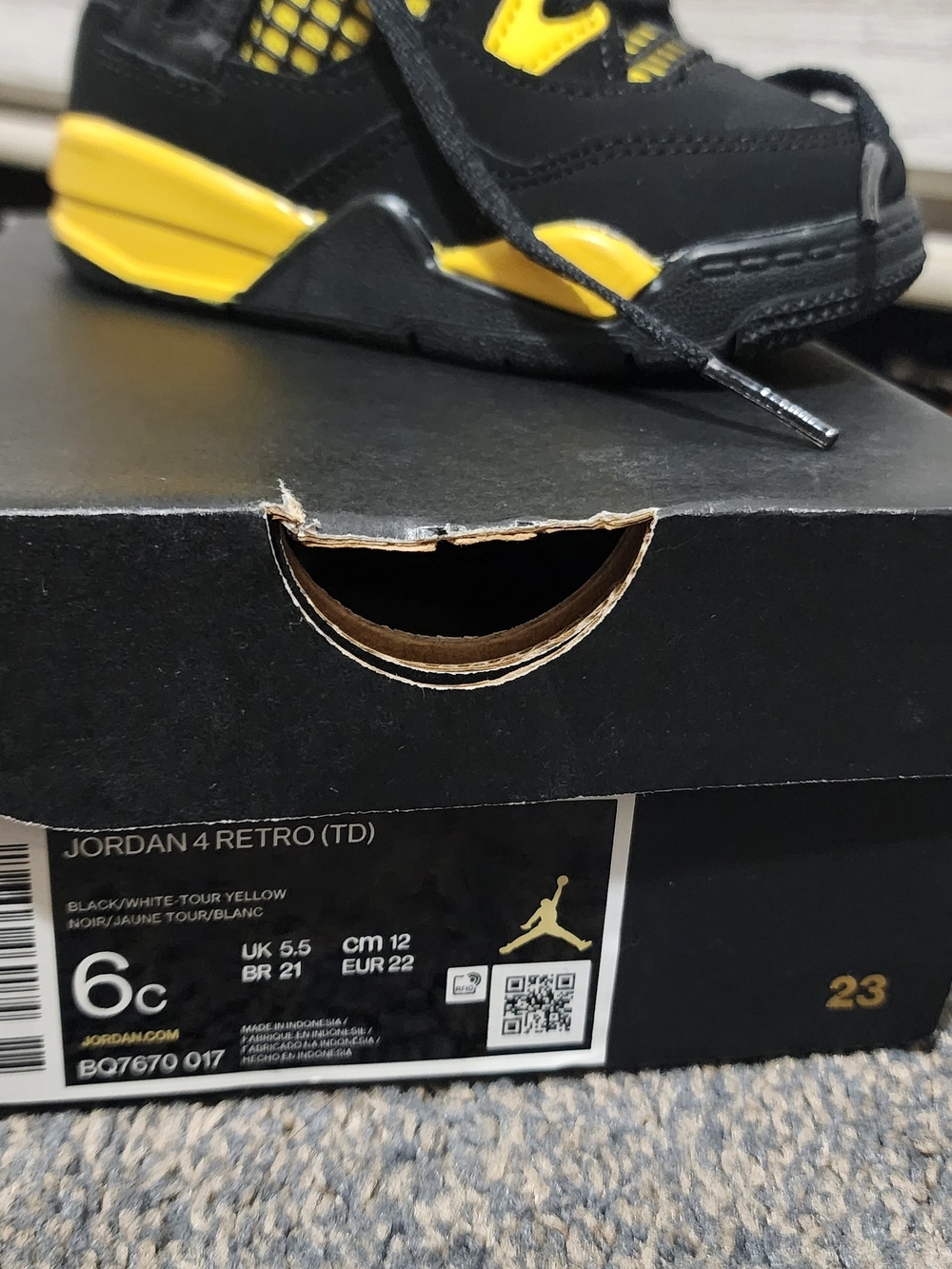 Jordan Retro 4 (Toddler) Black and Tour Yellow Sneakers
